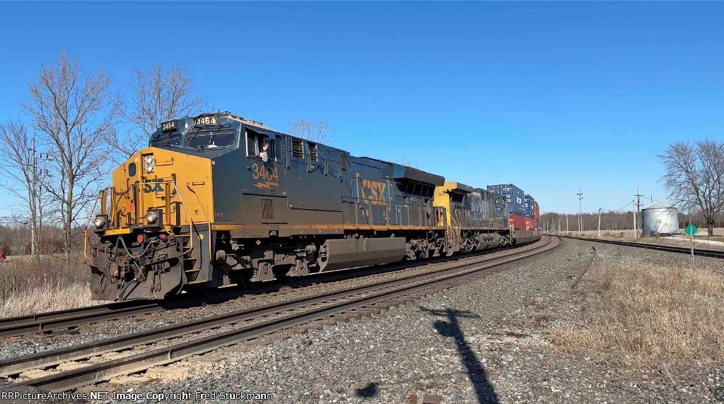 CSX 3464 took a hit to its number board, and leads I161.